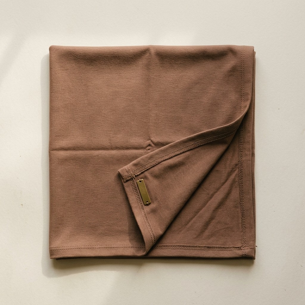 Bergo Rapi Jersey warna Mocha dilipat rapi.